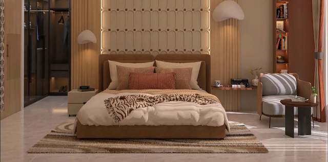Warm master bedroom with a backlit beige headboard wall of carved arch-shaped panels, a cognac upholstered bed with terracotta cushions and a zebra-print throw, white cloud pendant lamps, a glass-fronted walk-in wardrobe, a lit rust-red book niche and a sunlit grey lounge chair on marble floors.