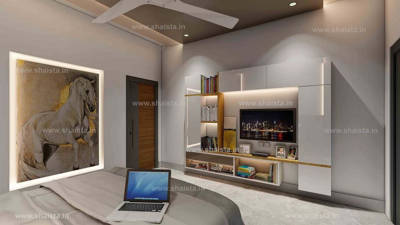 Bedroom media wall in white lacquer with gold trim and display niches, seen past a laptop on the bed, beside a large horse painting
