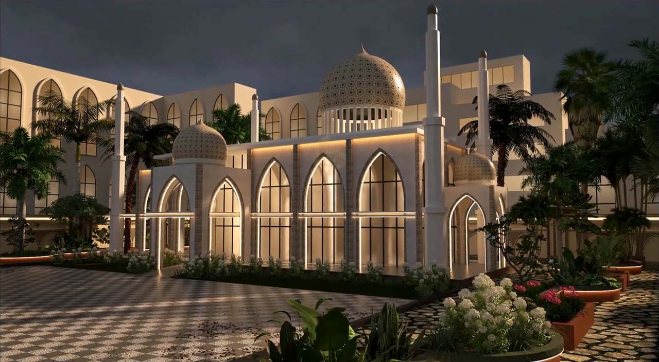 The same mosque courtyard at night: pointed arches traced in amber light, uplit lattice domes and minarets against a slate sky, lamplit planters on the checkerboard plaza