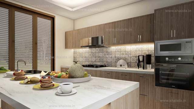 Close view of a white marble island set for breakfast in front of walnut cabinets and a patterned tile backsplash